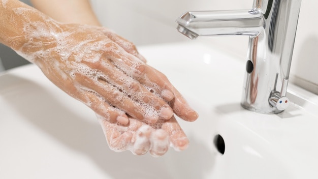 person-washing-hands